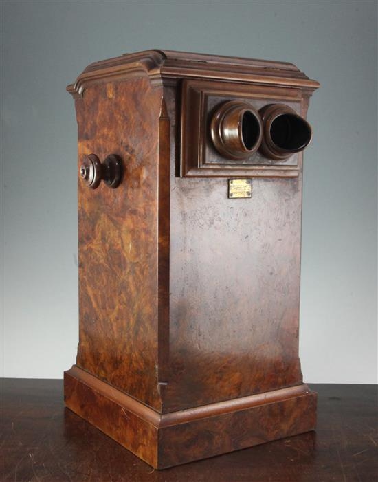 A Negretti & Zambra figured walnut stereoscopic slide viewer, H.21.5in.